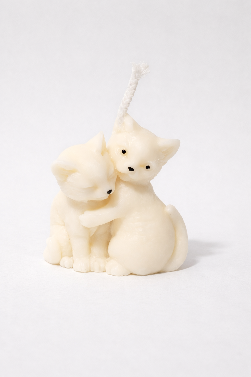 vela gatitos abrazados